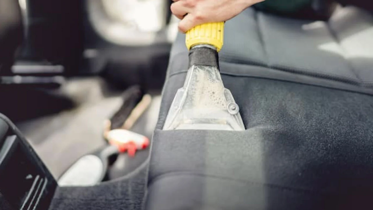 Premium Photo  Process of steam cleaning inside handle of car