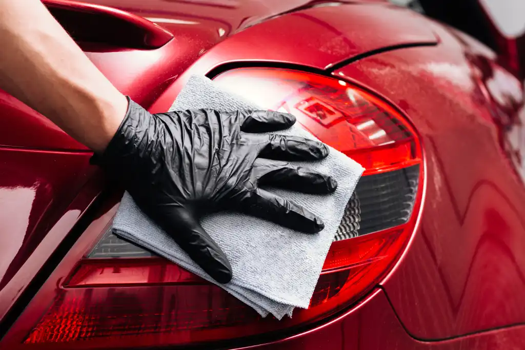 Image of a red car being detailed