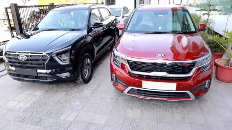 A Kia and Creta parked side by side