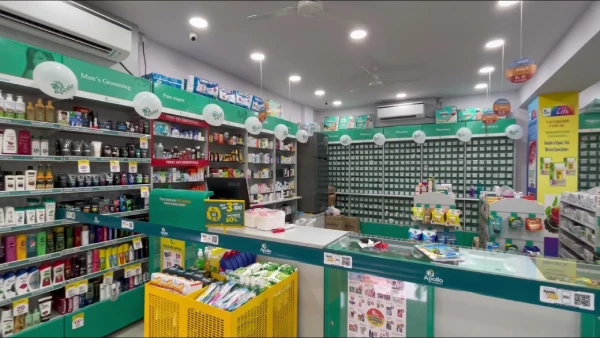 An Indian pharmacy store with teal colour schemes