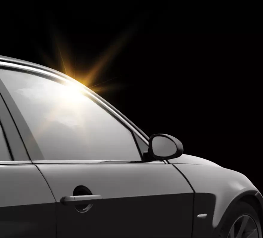 Car window reflacting sun light