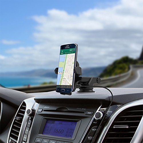 A smartphone mounted on a car dashboard
