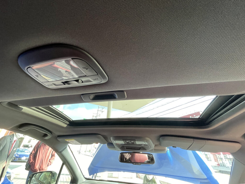 A sunroof on a car, seen from the back of the car