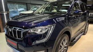 A striking blue Mahindra XUV 700 shining at a detailing studio after getting PPF installed