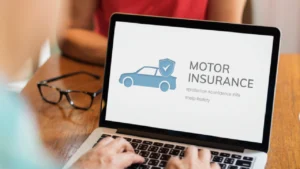 A man looks at a car insurance website page on his laptop screen