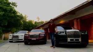 H20 CarzSpa Ahmedabad’s Harsh Tanna standing in front of 3 Rolls Royce luxury cars