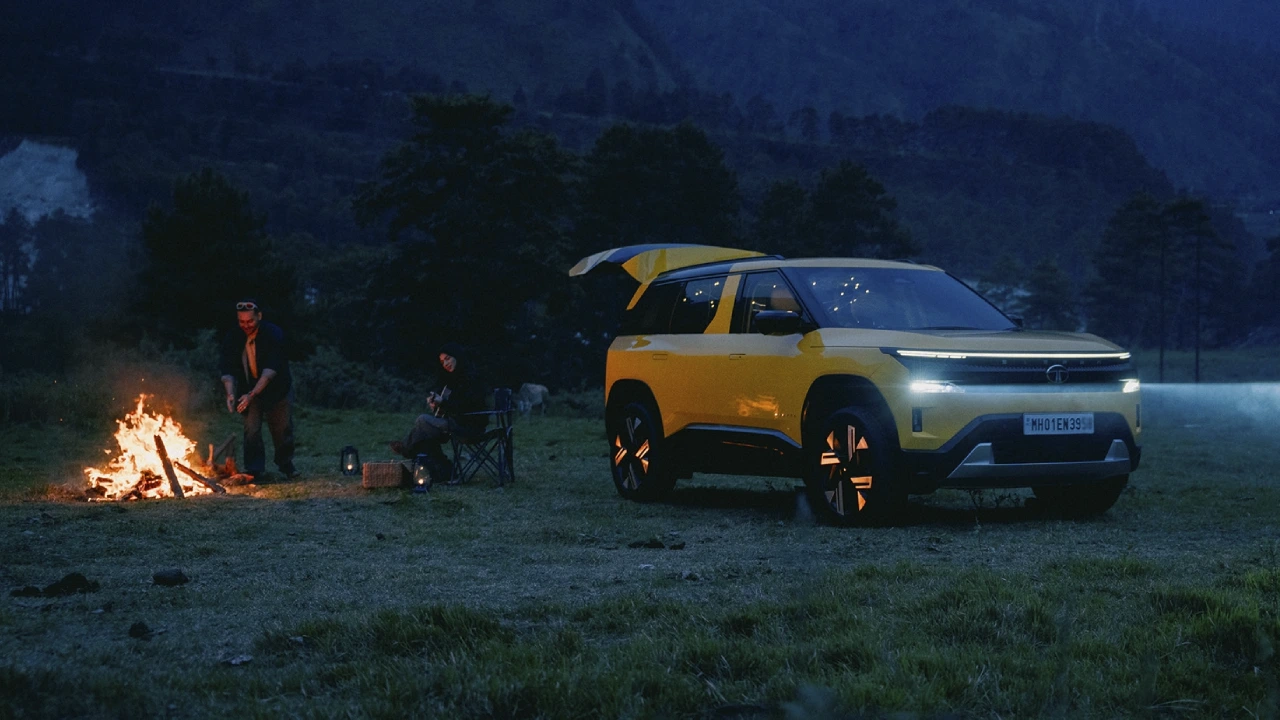 The old and new variants of Tata Sierra are parked on a well-lit stage together