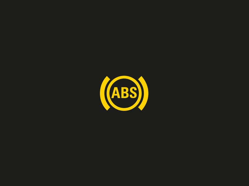 The ABS warning light is in yellow
