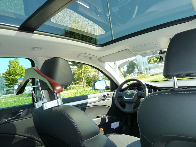 A Skoda Superb with a clear glass panoramic sunroof