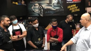 Anckur Sama training CarzSpa Detailing Studio owners inside a closed detailing bay