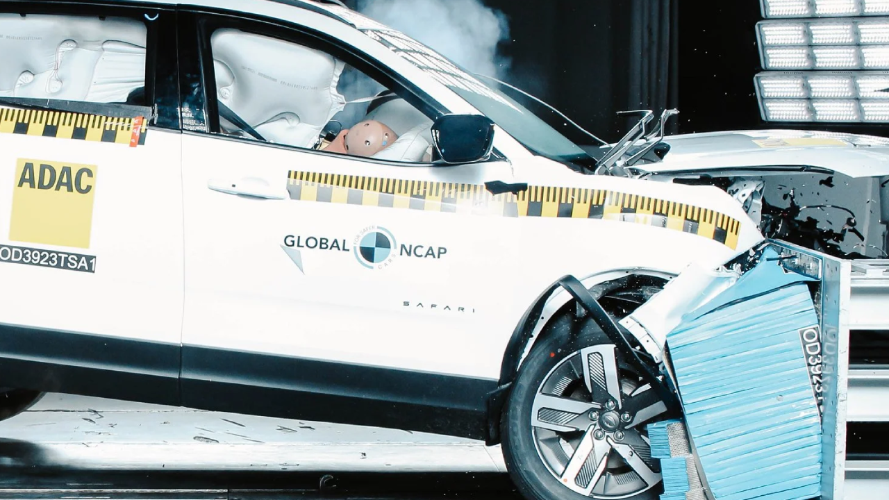 A Mahindra Thar Roxx navigating through a rocky riverbed in the Himalayas.