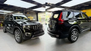 A Black Mahindra Scoprio parked inside a CarzSpa Detailing Studio
