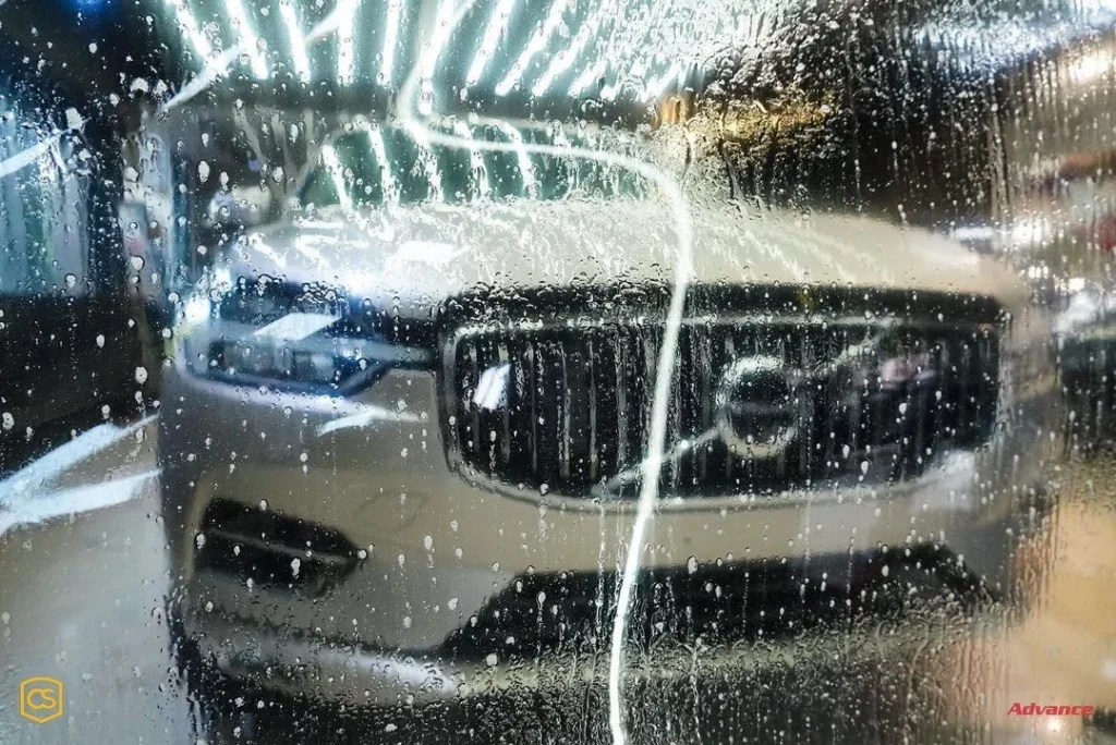 A PPF with solution sprayed on it, about to be applied on a Volvo