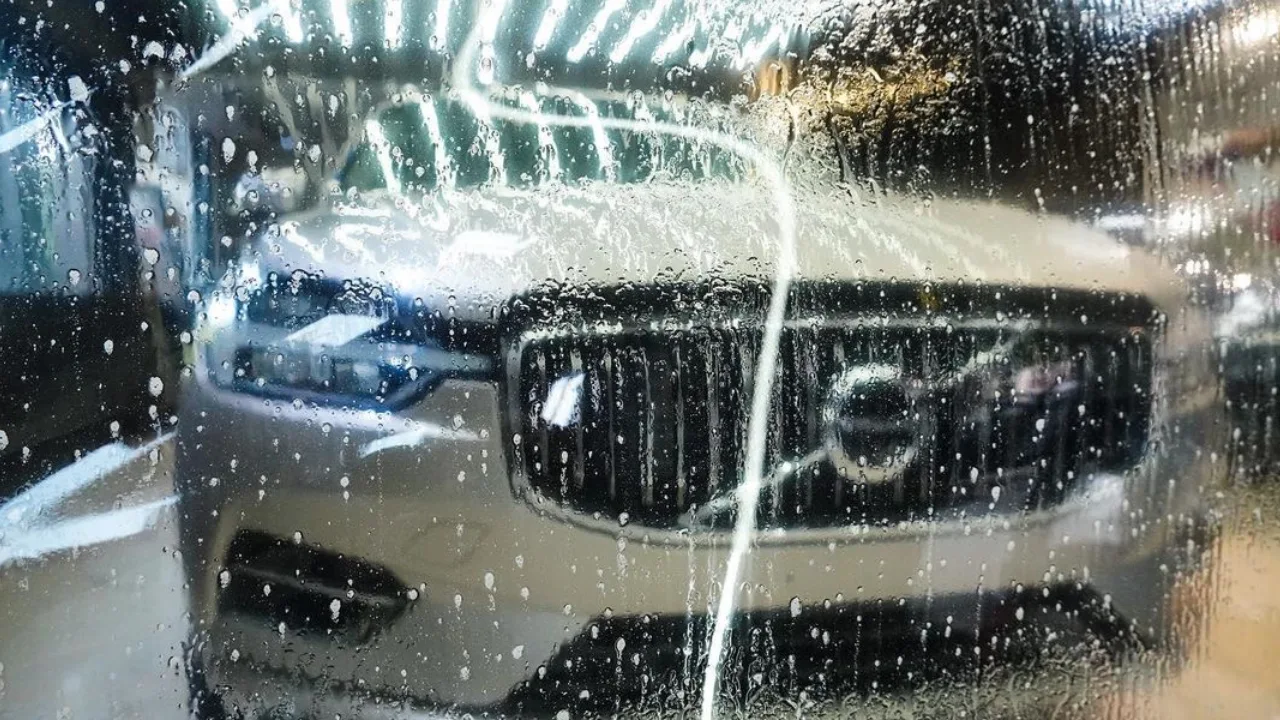 Paint protection film being installed on a car for long-term paint protection in India
